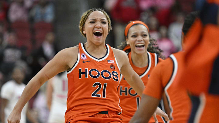 Feb 22, 2026; Louisville, Kentucky, USA;  Virginia Cavaliers guard Kymora Johnson (21) celebrates after time expires against the Louisville Cardinals during the second half at KFC Yum! Center.  Mandatory Credit: Jamie Rhodes-Imagn Images