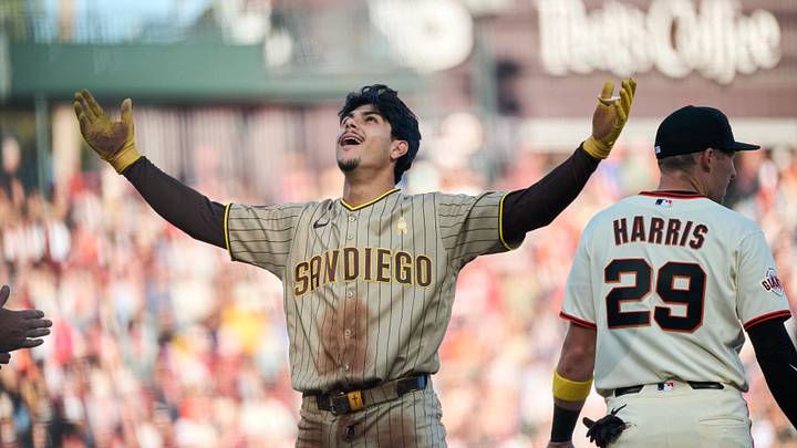Sep 13, 2026; San Francisco, California, USA; San Diego Padres catcher Ethan Salas (8) reacts at third base after hitting a triple against San Francisco Giants starting pitcher Logan Webb (not pictured) during the fourth inning at Oracle Park. Mandatory Credit: Robert Edwards-Imagn Images Sep 13, 2026; San Francisco, California, USA; San Diego Padres catcher Ethan Salas (8) reacts at third base after hitting a triple against San Francisco Giants starting pitcher Logan Webb (not pictured) during the fourth inning at Oracle Park. Mandatory Credit: Robert Edwards-Imagn Images