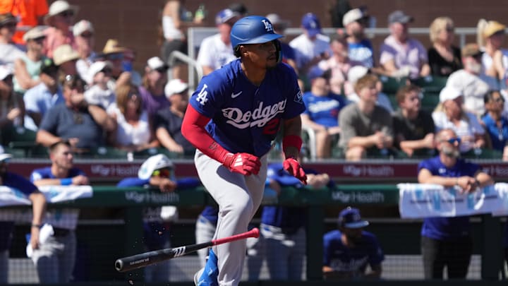 Feb 27, 2026; Scottsdale, Arizona, USA; Los Angeles Dodgers second baseman Santiago Espinal hits the ball into play against the San Francisco Giants in the first inning at Scottsdale Stadium. Mandatory Credit: Rick Scuteri-Imagn Images Feb 27, 2026; Scottsdale, Arizona, USA; Los Angeles Dodgers second baseman Santiago Espinal hits the ball into play against the San Francisco Giants in the first inning at Scottsdale Stadium. Mandatory Credit: Rick Scuteri-Imagn Images