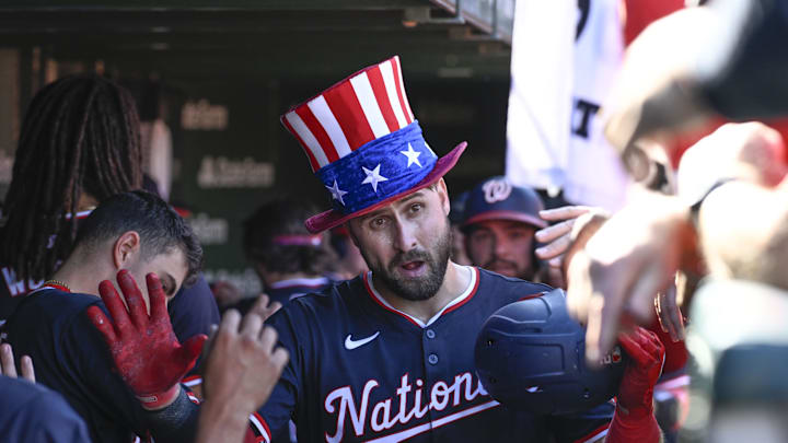 Sep 21, 2024; Chicago, Illinois, USA;  Washington Nationals first baseman Joey Gallo (24) celebrates in the dugout after he hits a three run home run against the Chicago Cubs during the sixth inning at Wrigley Field. Mandatory Credit: Matt Marton-Imagn Images