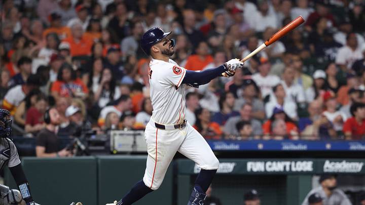 Apr 25, 2026; Houston, Texas, USA; Houston Astros shortstop Carlos Correa (1) hits a home run during the sixth inning against the New York Yankees at Daikin Park. Mandatory Credit: Troy Taormina-Imagn Images