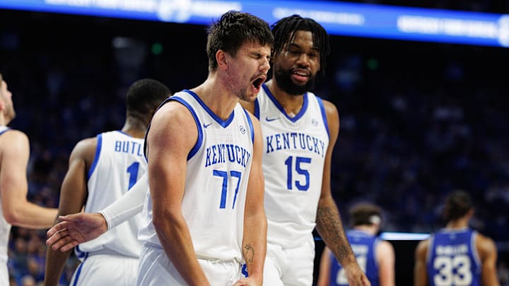 Nov 29, 2024; Lexington, Kentucky, USA; Kentucky Wildcats guard Kerr Kriisa (77) celebrates during the first half against the Georgia State Panthers at Rupp Arena at Central Bank Center. Mandatory Credit: Jordan Prather-Imagn Images