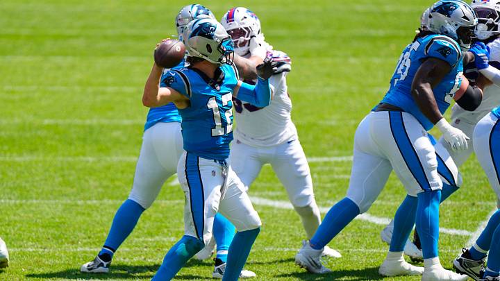 Carolina Panthers quarterback Kenny Pickett (12) throws the ball against the Buffalo Bills Carolina Panthers quarterback Kenny Pickett (12) throws the ball against the Buffalo Bills