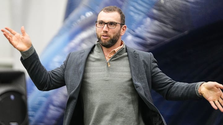 Former Colts quarterback Andrew Luck jogs into the crowd Friday, April 12, 2024, during the Chuckstrong Tailgate Gala at the Colts Practice Facility in Indianapolis.