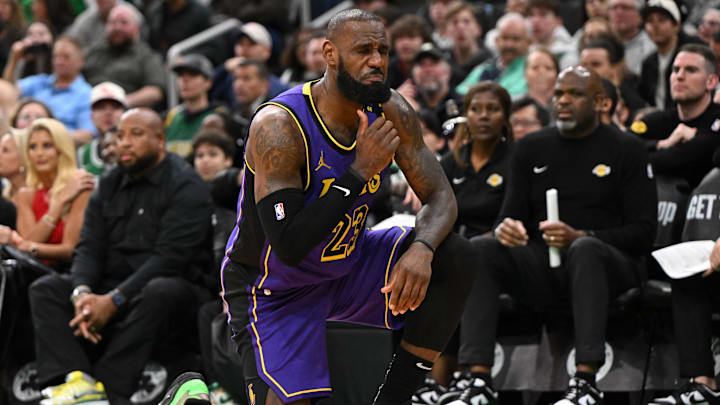 Mar 8, 2025; Boston, Massachusetts, USA; Los Angeles Lakers forward LeBron James (23) reacts after being fouled by Boston Celtics forward Jayson Tatum (not seen) during the fourth quarter at the TD Garden. Mandatory Credit: Brian Fluharty-Imagn Images