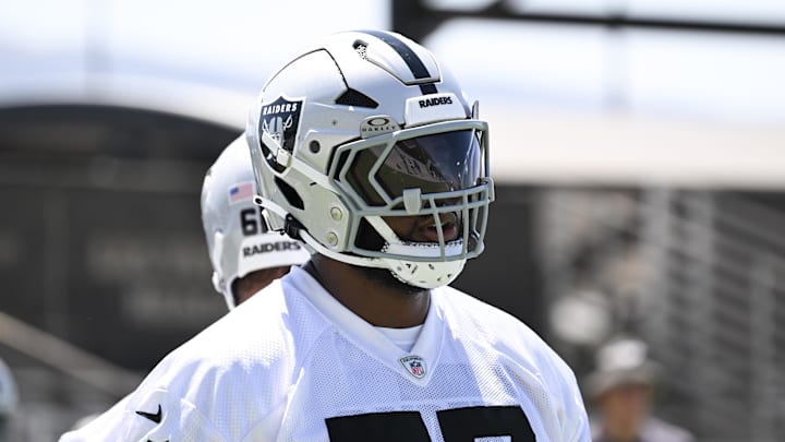 Jun 11, 2025; Henderson, NV, USA; Las Vegas Raiders offensive tackle Thayer Munford Jr. (77) runs through a drill during Las Vegas Raiders Minicamp at Intermountain Health Performance Center. Mandatory Credit: Candice Ward-Imagn Images