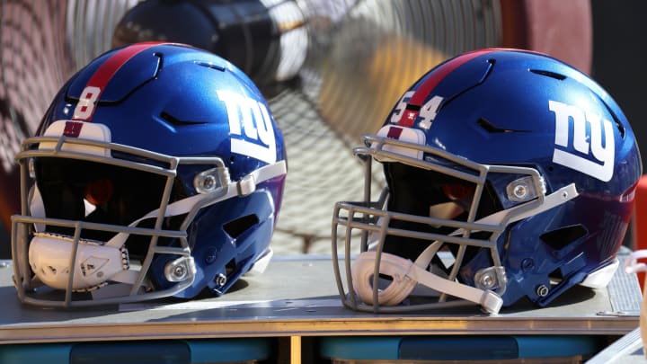 Nov 8, 2020; Landover, Maryland, USA; A view of the helmets of New York Giants quarterback Daniel Jones (8) and Giants inside linebacker Blake Martinez (54) resting on equipment case on the sidelines against the Washington Football Team at FedExField. Nov 8, 2020; Landover, Maryland, USA; A view of the helmets of New York Giants quarterback Daniel Jones (8) and Giants inside linebacker Blake Martinez (54) resting on equipment case on the sidelines against the Washington Football Team at FedExField.
