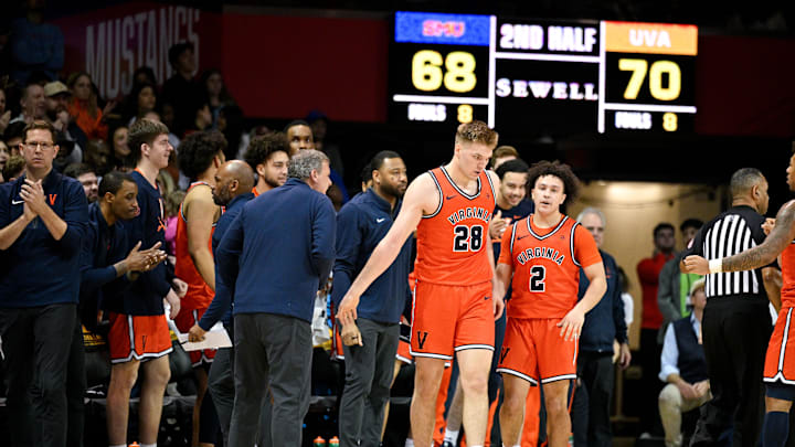 Jan 17, 2026; Dallas, Texas, USA; The Virginia Cavaliers bench celebrates as forward Thijs de Ridder (28) is fouled during the second half against the SMU Mustangs at Moody Coliseum. Mandatory Credit: Jerome Miron-Imagn Images