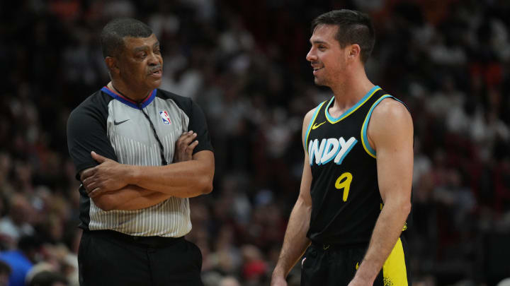 Dec 2, 2023; Miami, Florida, USA;  Indiana Pacers guard T.J. McConnell (9) talks with official Tony Brothers (25) during the second half at Kaseya Center. Mandatory Credit: Jim Rassol-USA TODAY Sports