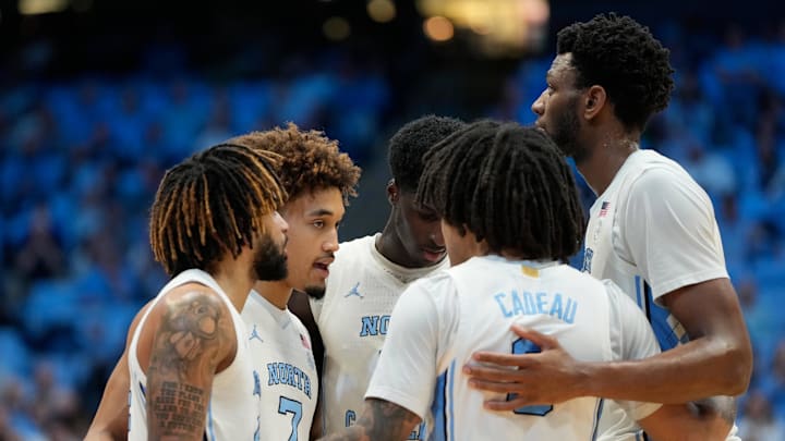 Feb 8, 2025; Chapel Hill, North Carolina, USA;  North Carolina Tar Heels players huddle in the second half at Dean E. Smith Center. Mandatory Credit: Bob Donnan-Imagn Images