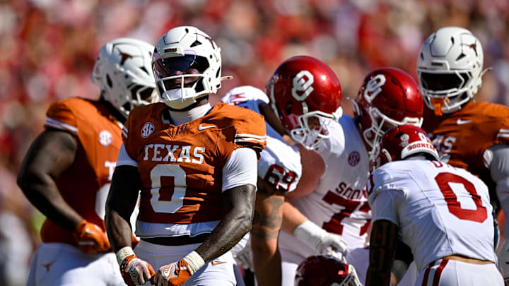 Oct 11, 2025; Dallas, Texas, USA; Texas Longhorns linebacker Anthony Hill Jr. (0) celebrates after a defensive stop against the Oklahoma Sooners during the first half at the Cotton Bowl. Mandatory Credit: Jerome Miron-Imagn Images