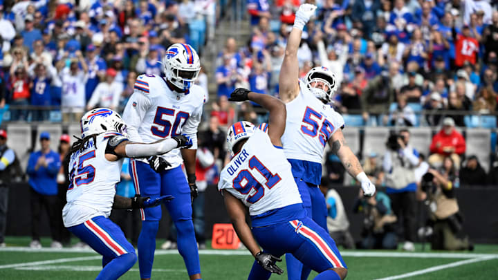 Oct 26, 2025; Charlotte, North Carolina, USA; Buffalo Bills linebacker Shaq Thompson (45), defensive end Greg Rousseau (50), defensive tackle Ed Oliver (91) and defensive end Michael Hoecht (55) celebrate after a sack Oct 26, 2025; Charlotte, North Carolina, USA; Buffalo Bills linebacker Shaq Thompson (45), defensive end Greg Rousseau (50), defensive tackle Ed Oliver (91) and defensive end Michael Hoecht (55) celebrate after a sack