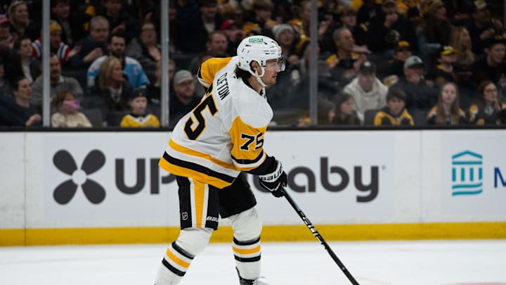 Jan 11, 2026; Boston, Massachusetts, USA; Pittsburgh Penguins defenseman Connor Clifton (75) skates with the puck during the first period of the game against the Boston Bruins at TD Garden. Mandatory Credit: Natalie Reid-Imagn Images