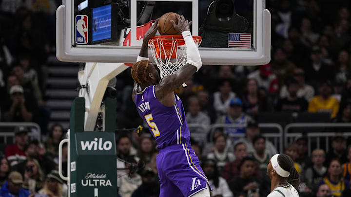 Nov 15, 2025; Milwaukee, Wisconsin, USA; Los Angeles Lakers center Deandre Ayton (5) dunks during the first quarter against the Milwaukee Bucks at Fiserv Forum. Mandatory Credit: Jeff Hanisch-Imagn Images Nov 15, 2025; Milwaukee, Wisconsin, USA; Los Angeles Lakers center Deandre Ayton (5) dunks during the first quarter against the Milwaukee Bucks at Fiserv Forum. Mandatory Credit: Jeff Hanisch-Imagn Images
