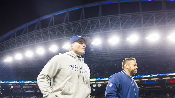 Dec 15, 2024; Seattle, Washington, USA; Seattle Seahawks head coach Mike Macdonald, left, walks to the locker room following a loss against the Green Bay Packers at Lumen Field. Mandatory Credit: Joe Nicholson-Imagn Images Dec 15, 2024; Seattle, Washington, USA; Seattle Seahawks head coach Mike Macdonald, left, walks to the locker room following a loss against the Green Bay Packers at Lumen Field. Mandatory Credit: Joe Nicholson-Imagn Images