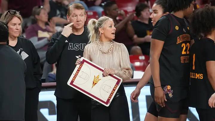 ASU Sun Devils head coach Molly Miller talks to her team on the sidelines as they play the Kansas State Wildcats at Desert Financial Arena in Tempe on Feb. 1, 2026. ASU Sun Devils head coach Molly Miller talks to her team on the sidelines as they play the Kansas State Wildcats at Desert Financial Arena in Tempe on Feb. 1, 2026.