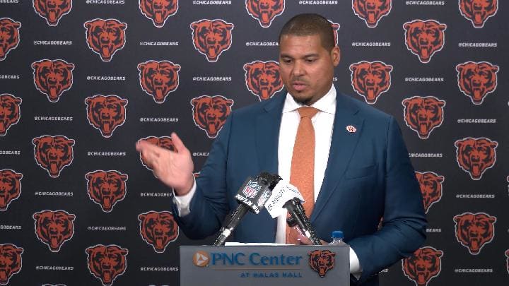 Ryan Poles makes a point about Dillon Thieneman on draft night at Halas Hall.