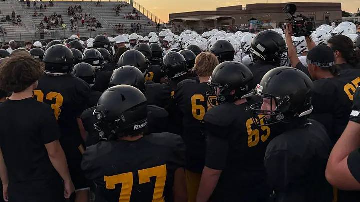 Saguaro High School football huddles up in a 2025 practice. | Saguaro HS Facebook Saguaro High School football huddles up in a 2025 practice. | Saguaro HS Facebook