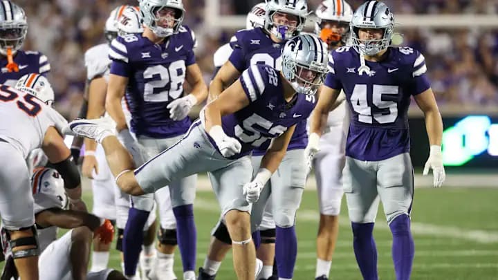 Ryan Davis (#52) celebrates a sack with his teammates. Ryan Davis (#52) celebrates a sack with his teammates.