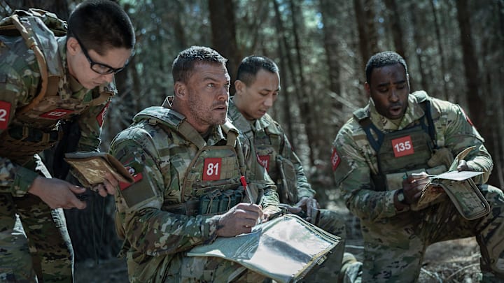 War Machine. (L-R) Heather Burridge as 122, Alan Ritchson as 81, Yuchen Wang as 111 and Victory Noukwe as 135 in War Machine War Machine. (L-R) Heather Burridge as 122, Alan Ritchson as 81, Yuchen Wang as 111 and Victory Noukwe as 135 in War Machine
