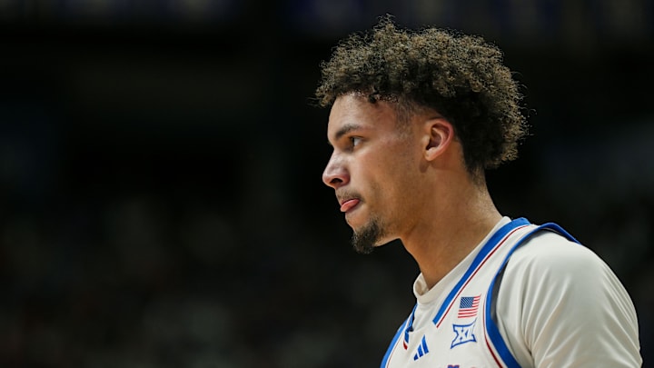 Feb 3, 2025; Lawrence, Kansas, USA; Kansas Jayhawks guard Zeke Mayo (5) reacts during the first half against the Iowa State Cyclones at Allen Fieldhouse. Mandatory Credit: Jay Biggerstaff-Imagn Images