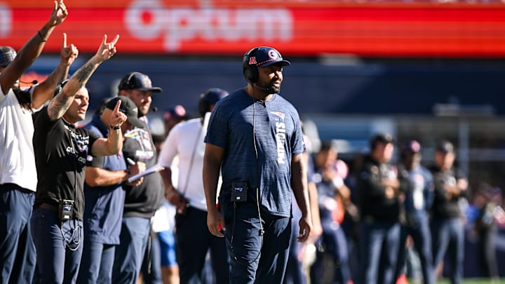 Oct 6, 2024; Foxborough, Massachusetts, USA; New England Patriots head coach Jerod Mayo watches the game against the Miami Dolphins during the second half at Gillette Stadium. Mandatory Credit: Brian Fluharty-Imagn Images