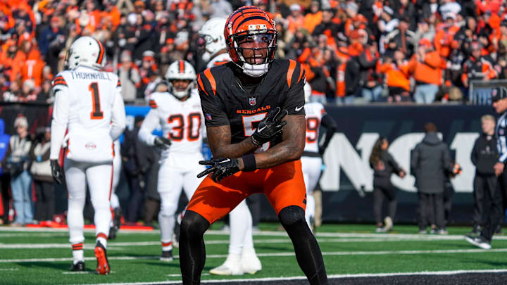 Cincinnati Bengals wide receiver Tee Higgins (5) celebrates a touchdown reception in the first quarter of the NFL Week 16 game between the Cincinnati Bengals and the Cleveland Browns at Paycor Stadium in downtown Cincinnati on Sunday, Dec. 22, 2024. The Bengals led 17-0 at halftime.