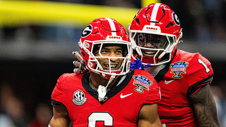 Georgia defensive back Daylen Everette (6) celebrates with Georgia defensive back Ellis Robinson IV (1) after returning a fumble for a touchdown during the Sugar Bowl and College Football Playoff quarterfinals at Caesars Superdome in New Orleans, La., on Thursday, Jan. 1, 2026. Ole Miss defeated Georgia 39-34.