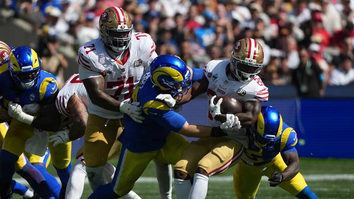 Sep 11, 2026; Melbourne, AUS; San Francisco 49ers running back Kaelon Black (26) rushes the ball against the Los Angeles Rams in the second half at Melbourne Cricket Ground. Mandatory Credit: Kirby Lee-Imagn Images Sep 11, 2026; Melbourne, AUS; San Francisco 49ers running back Kaelon Black (26) rushes the ball against the Los Angeles Rams in the second half at Melbourne Cricket Ground. Mandatory Credit: Kirby Lee-Imagn Images