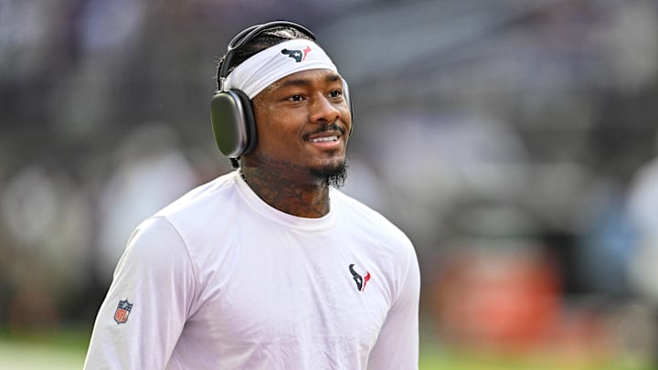Sep 22, 2024; Minneapolis, Minnesota, USA; Houston Texans wide receiver Stefon Diggs (1) warms up before the game against the Minnesota Vikings at U.S. Bank Stadium. Mandatory Credit: Jeffrey Becker-Imagn Images