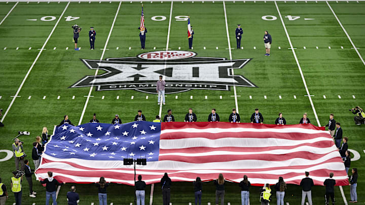 Dec 7, 2024; Arlington, TX, USA; A view of the Big 12 logo and American flag before the game between the Iowa State Cyclones and the Arizona State Sun Devils at AT&T Stadium. Mandatory Credit: Jerome Miron-Imagn Images