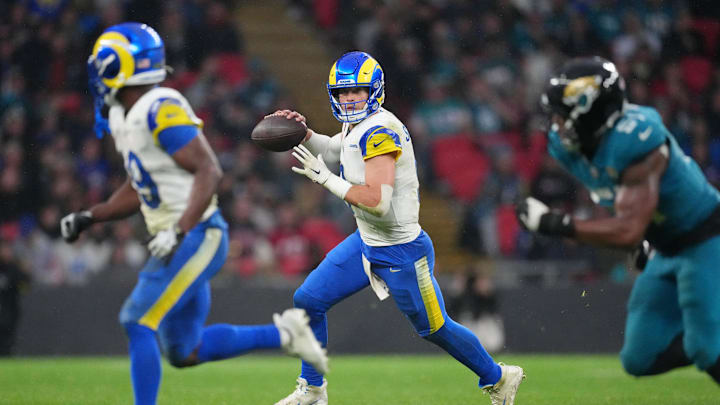 Oct 19, 2025; London, United Kingdom; Los Angeles Rams quarterback Matthew Stafford (9) looks to pass the ball against the Jacksonville Jaguars during the second half of an NFL International Series game at Wembley Stadium. Mandatory Credit: Kirby Lee-Imagn Images