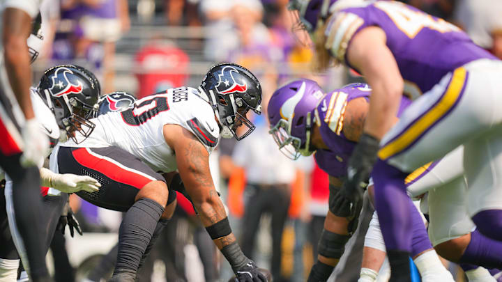 Sep 22, 2024; Minneapolis, Minnesota, USA; Houston Texans center Juice Scruggs (70) at the line of scrimmage against the Minnesota Vikings in the first quarter at U.S. Bank Stadium. Mandatory Credit: Brad Rempel-Imagn Images