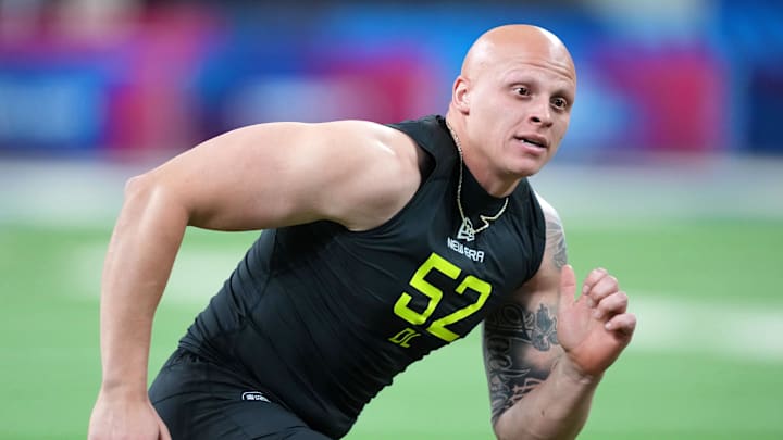 Arkansas defensive lineman Landon Jackson participates in drills during the NFL Combine at Lucas Oil Stadium.