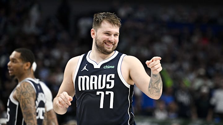 May 26, 2024; Dallas, Texas, USA; Dallas Mavericks guard Luka Doncic (77) points to the crowd during the second half against the Minnesota Timberwolves in game three of the western conference finals for the 2024 NBA playoffs at American Airlines Center. Mandatory Credit: Jerome Miron-USA TODAY Sports