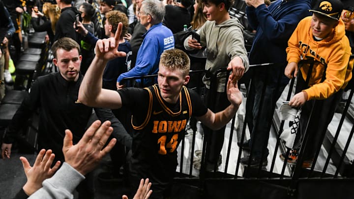 Feb 17, 2026; Iowa City, Iowa, USA; Iowa Hawkeyes guard Bennett Stirtz (14) reacts while coming off the court after the game against the Nebraska Cornhuskers at Carver-Hawkeye Arena. Mandatory Credit: Jeffrey Becker-Imagn Images