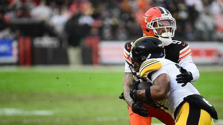 Dec 28, 2025; Cleveland, Ohio, USA; Pittsburgh Steelers tight end Jonnu Smith (81) is tackled by Cleveland Browns safety Grant Delpit (9) in the first quarter at Huntington Bank Field. Mandatory Credit: Ken Blaze-Imagn Images Dec 28, 2025; Cleveland, Ohio, USA; Pittsburgh Steelers tight end Jonnu Smith (81) is tackled by Cleveland Browns safety Grant Delpit (9) in the first quarter at Huntington Bank Field. Mandatory Credit: Ken Blaze-Imagn Images