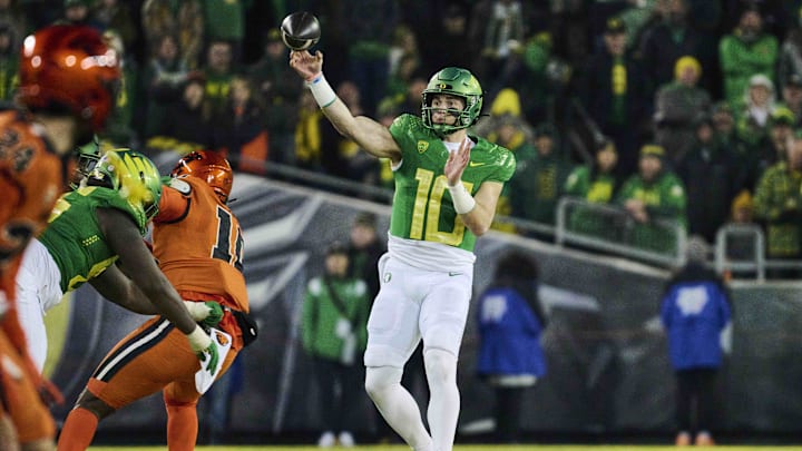 Nov 24, 2023; Eugene, Oregon, USA; Oregon Ducks quarterback Bo Nix (10) throws a pass during the