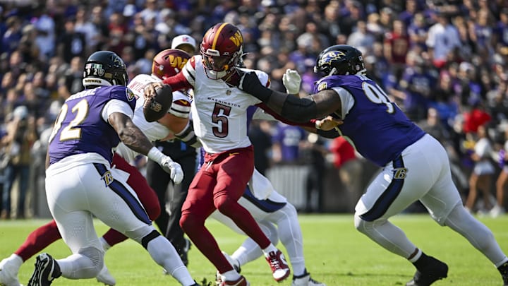 Baltimore Ravens defensive tackle Travis Jones sacks Washington Commanders quarterback Jayden Daniels (5) during the first quarter at M&T Bank Stadium. Mandatory Credit: Tommy Gilligan-Imagn Images Baltimore Ravens defensive tackle Travis Jones sacks Washington Commanders quarterback Jayden Daniels (5) during the first quarter at M&T Bank Stadium. Mandatory Credit: Tommy Gilligan-Imagn Images