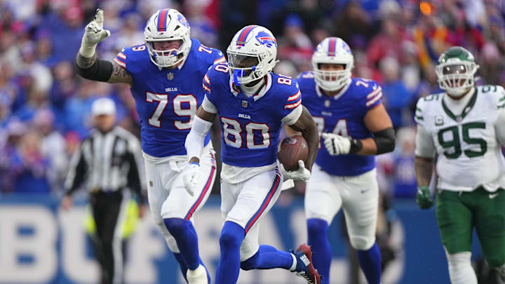 Dec 29, 2024; Orchard Park, New York, USA; Buffalo Bills wide receiver Tyrell Shavers (80) runs with the ball after making a catch and scores a touchdown