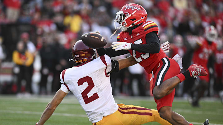 Oct 19, 2024; College Park, Maryland, USA;Maryland Terrapins defensive back Kevis Thomas (25) breaks up a pass intended for Southern California Trojans wide receiver Duce Robinson (2) during the first half   at SECU Stadium. Mandatory Credit: Tommy Gilligan-Imagn Images