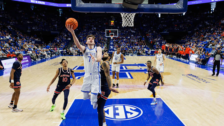 Mar 1, 2025; Lexington, Kentucky, USA; Kentucky Wildcats forward Andrew Carr (7) goes to the basket during the second half against the Auburn Tigers at Rupp Arena at Central Bank Center. Mandatory Credit: Jordan Prather-Imagn Images