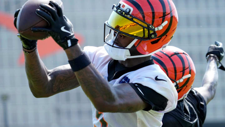 Cincinnati Bengals wide receiver Tee Higgins (5) catches a pass during the second day of preseason training camp in downtown Cincinnati on Thursday, July 24, 2025.