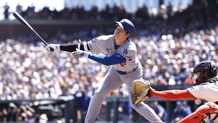 Apr 23, 2026; San Francisco, California, USA; Los Angeles Dodgers designated hitter Shohei Ohtani (17) swings ahead of San Francisco Giants catcher Patrick Bailey (14) during the fourth inning at Oracle Park. Mandatory Credit: Kelley L Cox-Imagn Images