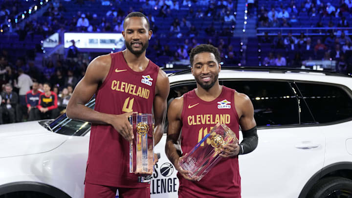 Feb 15, 2025; San Francisco, CA, USA; Team Cavs center Evan Mobley (4) and guard Donovan Mitchell (45) of the Cleveland Cavaliers celebrate with the trophies after winning the skills challenge during All Star Saturday Night ahead of the 2025 NBA All Star Game at Chase Center. Mandatory Credit: Kyle Terada-Imagn Images
