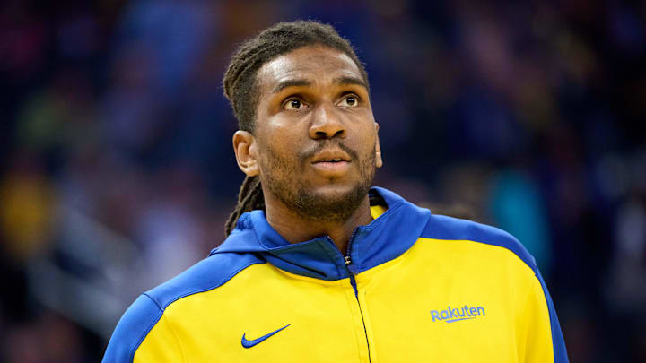 Apr 13, 2025; San Francisco, California, USA; Golden State Warriors forward Kevon Looney (5) warms up before the game between the Golden State Warriors and the LA Clippers at Chase Center. Mandatory Credit: Robert Edwards-Imagn Images