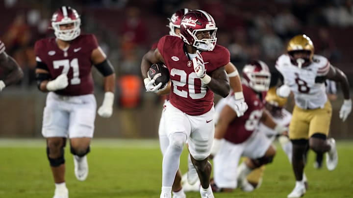 Sep 13, 2025; Stanford, California, USA; Stanford Cardinal running back Micah Ford (20) carries the ball against the Boston College Eagles during the fourth quarter at Stanford Stadium. Mandatory Credit: Darren Yamashita-Imagn Images Sep 13, 2025; Stanford, California, USA; Stanford Cardinal running back Micah Ford (20) carries the ball against the Boston College Eagles during the fourth quarter at Stanford Stadium. Mandatory Credit: Darren Yamashita-Imagn Images