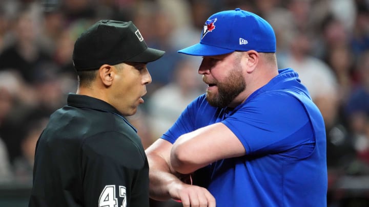 Toronto Blue Jays manager John Schneider (14) argues with home plate umpire Gabe Morales (47) after being ejected during the seventh inning of the game against the Arizona Diamondbacks at Chase Field on July 14.
