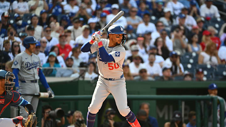 Apr 4, 2026; Washington, District of Columbia, USA; Los Angeles Dodgers shortstop Mookie Betts (50) at bat against the Washington Nationals during the first inning at Nationals Park. Mandatory Credit: Brad Mills-Imagn Images Apr 4, 2026; Washington, District of Columbia, USA; Los Angeles Dodgers shortstop Mookie Betts (50) at bat against the Washington Nationals during the first inning at Nationals Park. Mandatory Credit: Brad Mills-Imagn Images