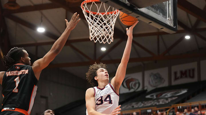 Gonzaga Bulldogs forward Braden Huff (34) shoots against Pacific Tigers guard Lamar Washington (1) during the second half at Alex G. Spanos Center